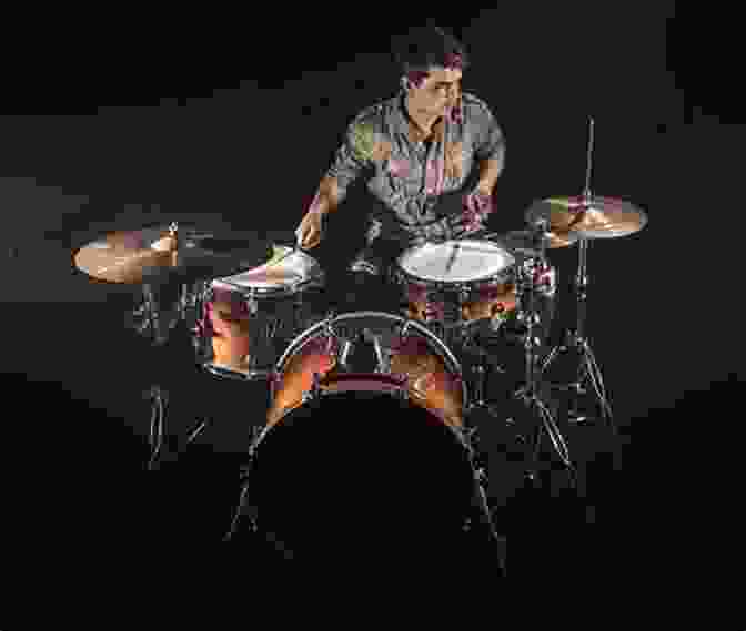 A Drummer Playing A Drum Set On Stage During A Concert Foundations For Drummers: The Technical And Creative Skills Essential To Becoming A Successful Drummer And Musician