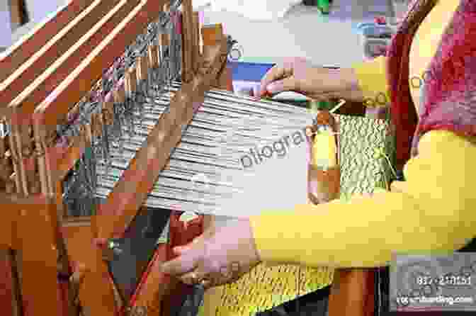 A Skilled Craftswoman Weaving A Shawl On A Traditional Loom Shawls Wraps And Scarves: 21 Elegant And Graceful Hand Knit Patterns