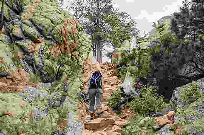 Hikers Scaling A Rock Formation In Lory State Park 100 Things To Do In Fort Collins Before You Die