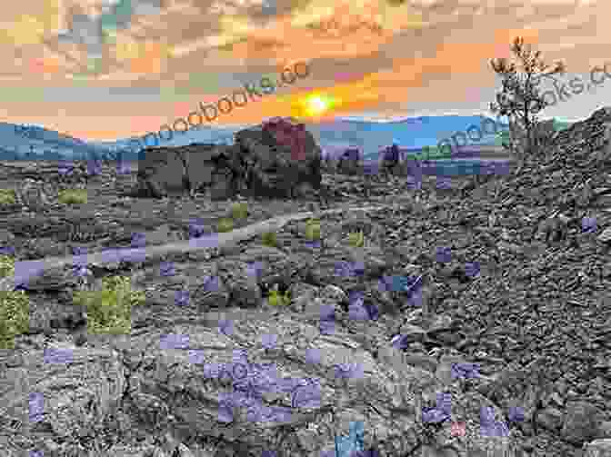 Hikers Traverse A Rugged Trail Amidst The Volcanic Formations Of Craters Of The Moon National Monument Craters Of The Moon: Craters Of The Moon National Monument