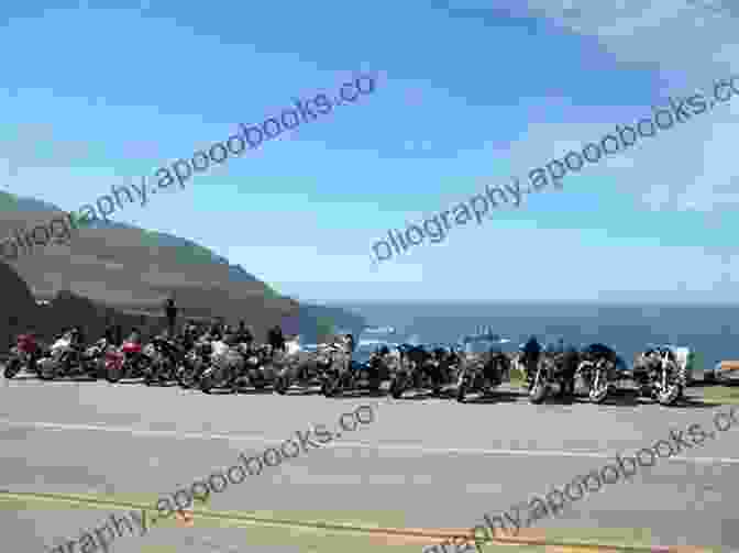 Motorcycle Riding Along The Picturesque Pacific Coast Highway, With The Pacific Ocean And Rolling Hills In The Background Motorcycle Routes Around Los Angeles