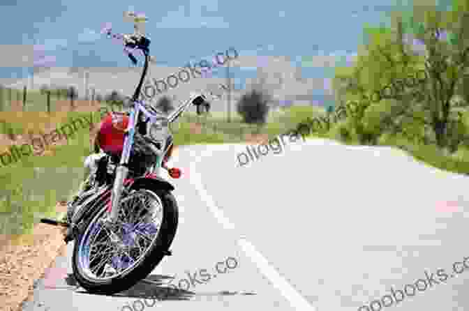 Motorcycle Riding On A Secluded Canyon Road, Surrounded By Lush Vegetation And Towering Cliffs Motorcycle Routes Around Los Angeles