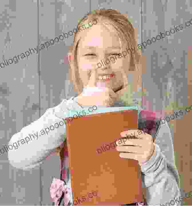 Smiling Child Holding A Book Helping Children To Manage Transitions: Photocopiable Activity Booklet To Support Wellbeing And Resilience (Helping Children To Build Wellbeing And Resilience)